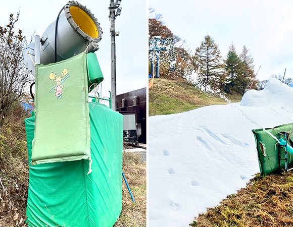 筒状の降雪機と雪を噴出している造雪機